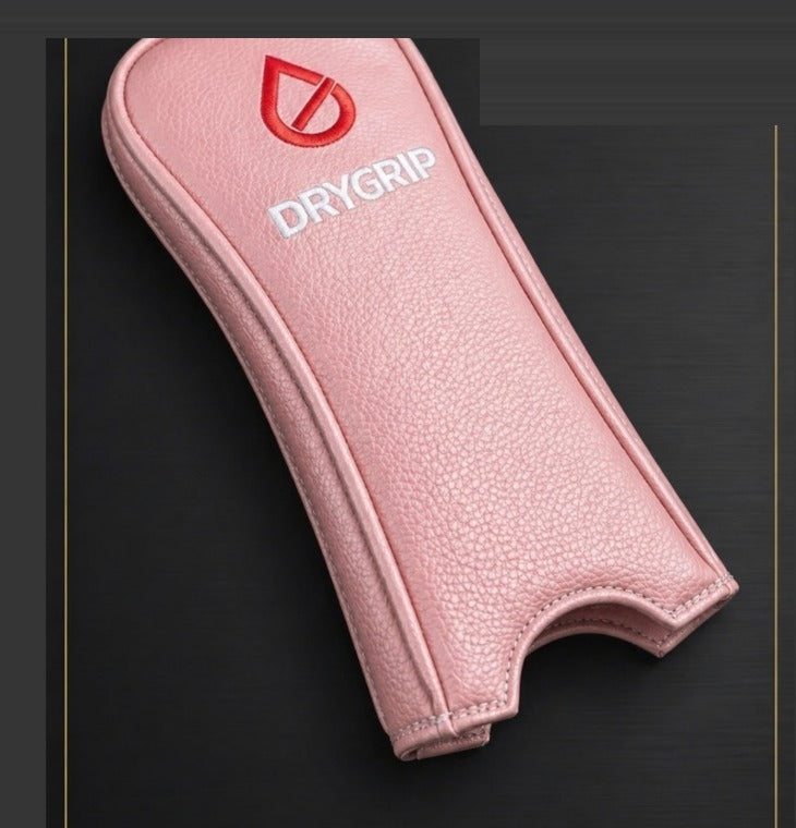 Pink DryGrip™ golf grip cover with white trim
